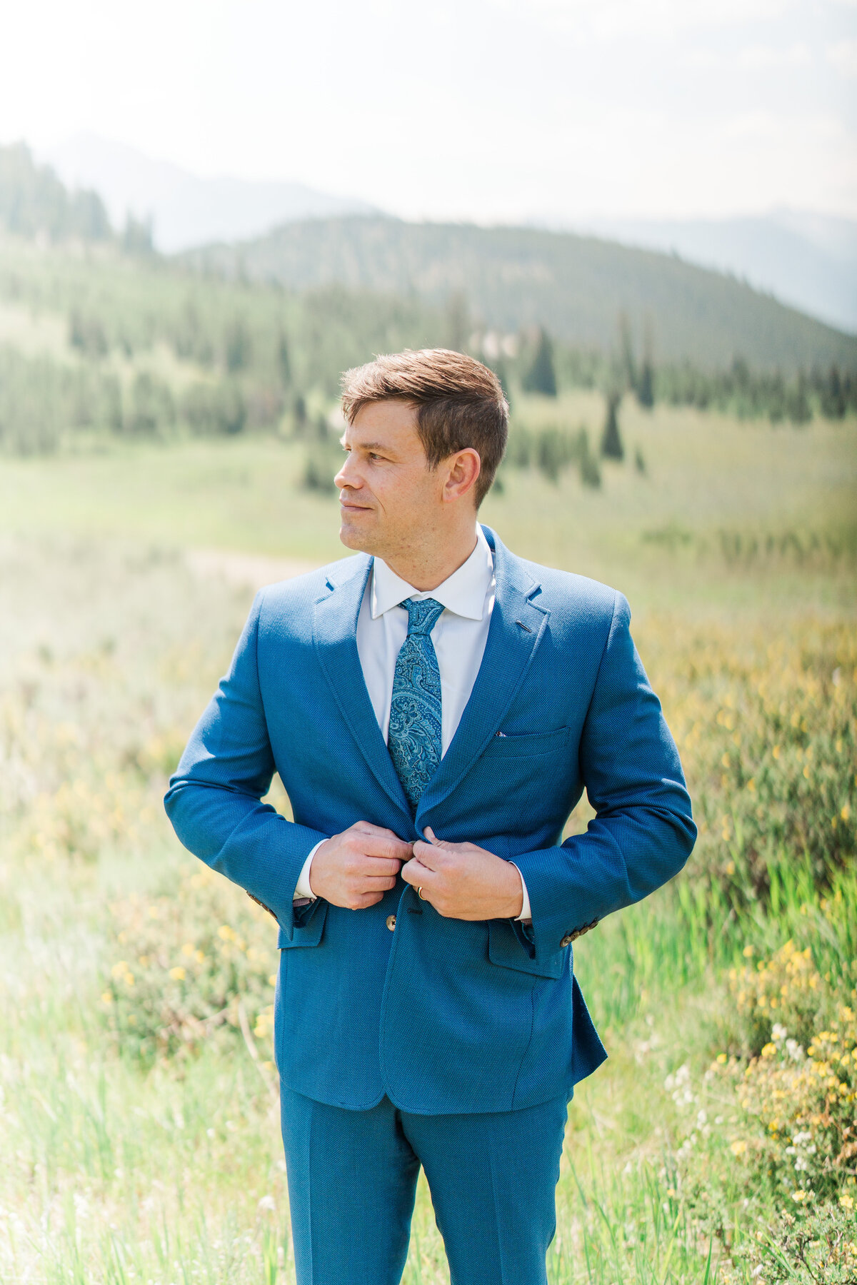 Lake Dillion Reservoir Colorado Elopement Wedding Mountain View Summer Pink and Orange Florals Sparkly Dress Light and Airy Elena Spraguer Photography0080