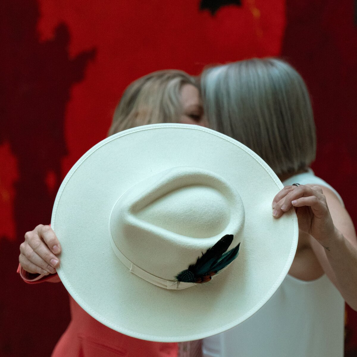 denver colorado wedding photographer - couple holding hat