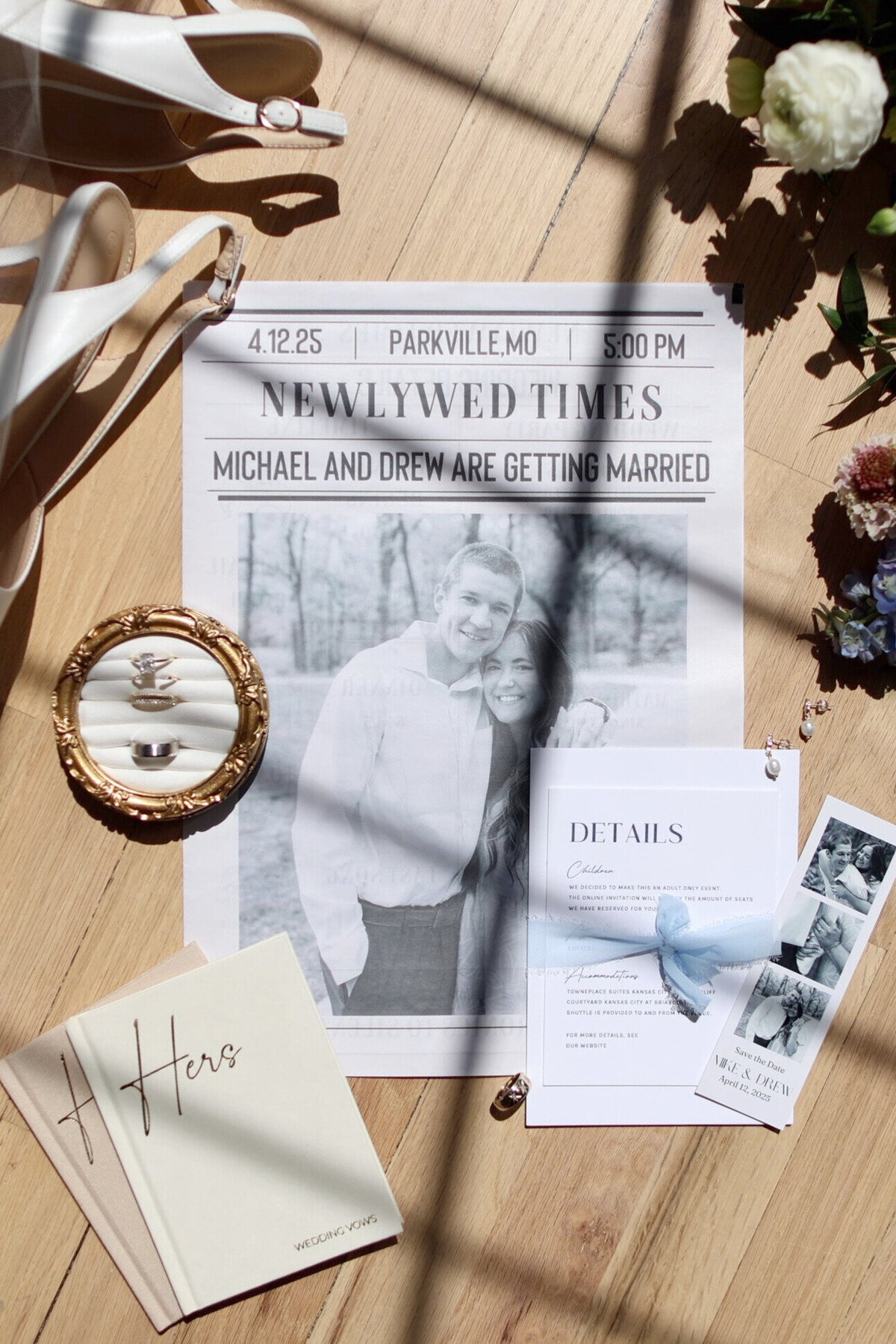 A flat lay of wedding details with sun coming through a window at Hawthorne House