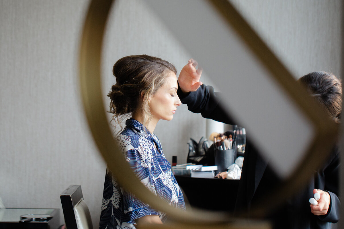 Bride gets galm during her makeup application at Scioto Country Club in Columbus Ohio