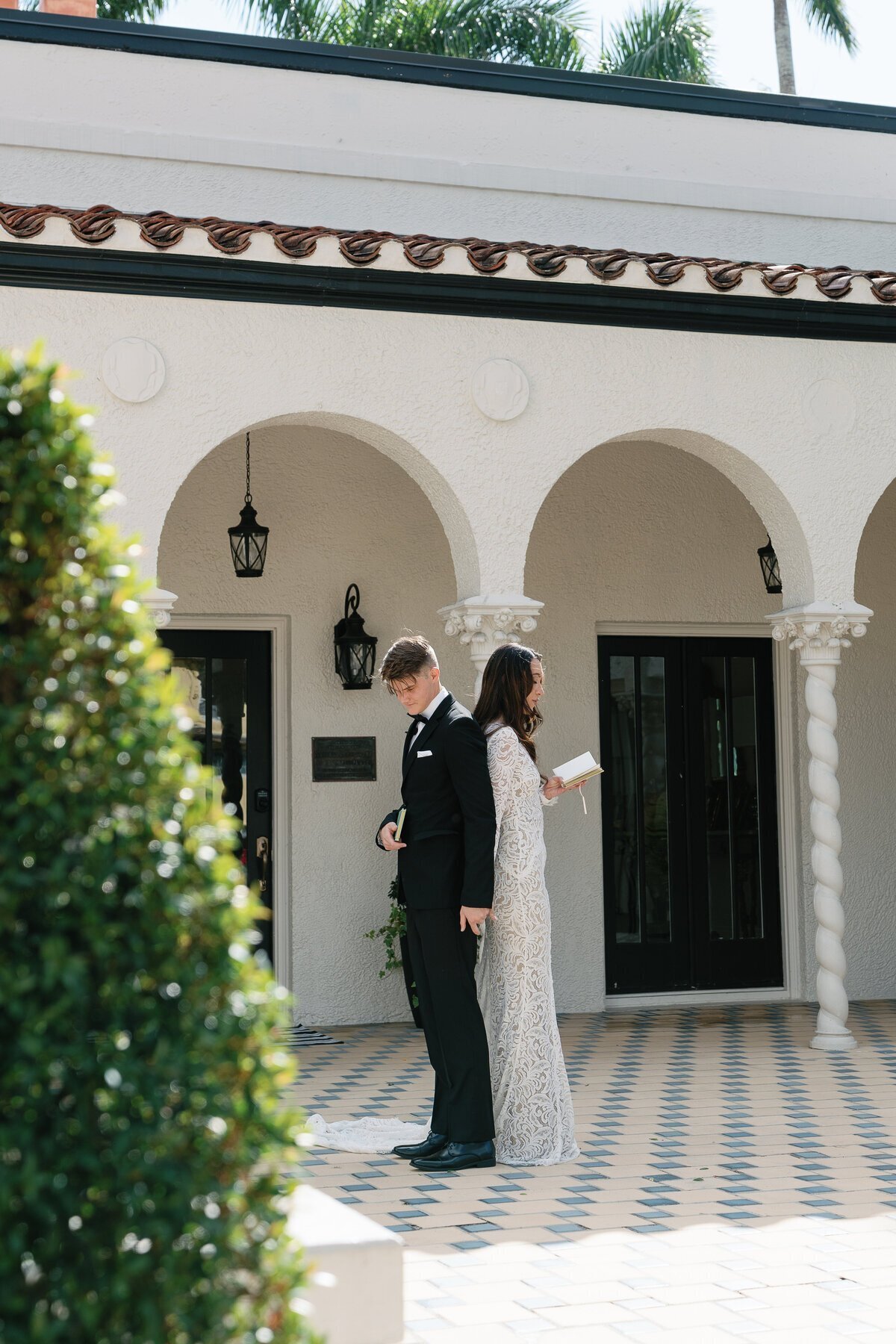 Bride and groom back to back taken by film wedding photographers