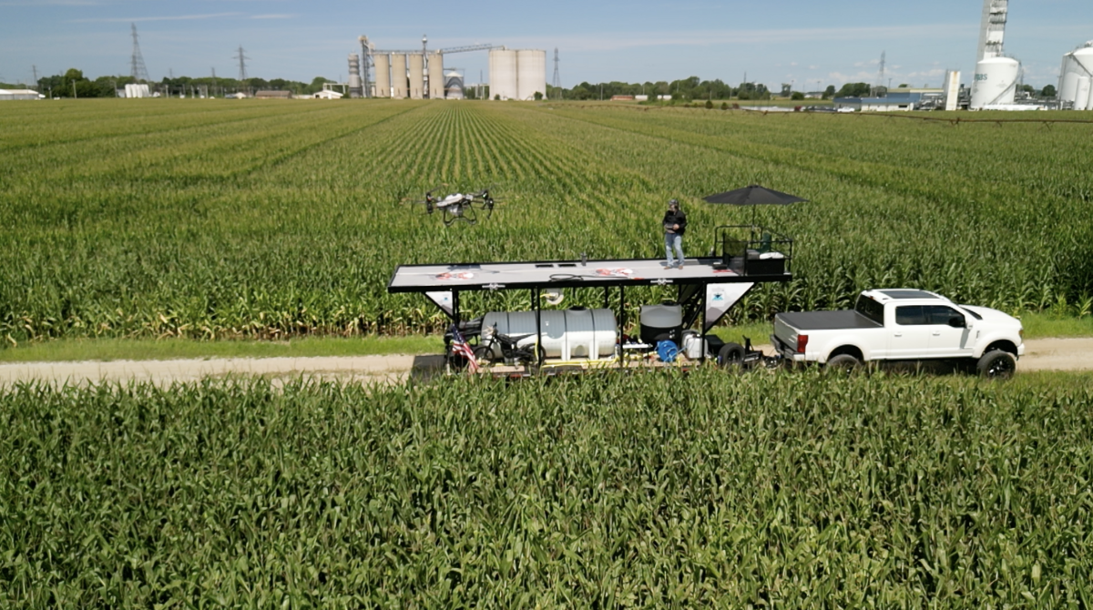 Raven 6 Rising flying aerial drone operations  while applying fungicide over cron fields
