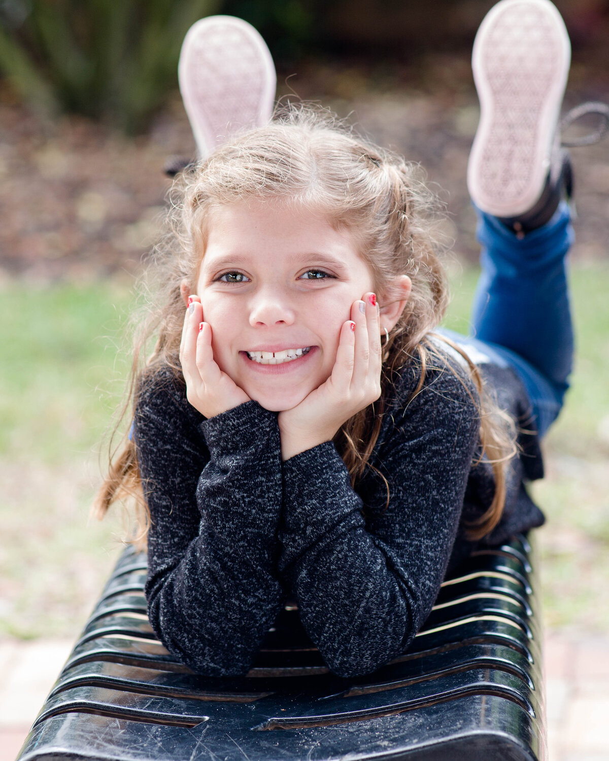 family portrait little girl posingby Lucas Mason Photography in Orlando, Windermere, Winder Garden area
