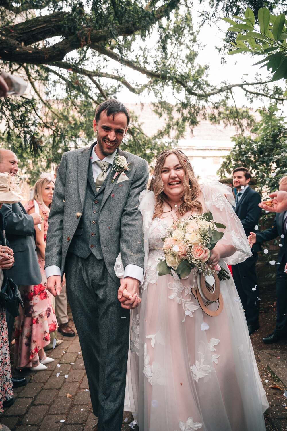 Bride and Groom walking out of ceremony looking very happy
