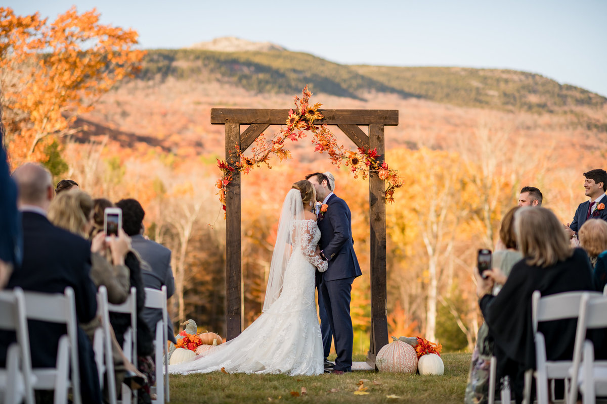 first kiss in the fall with mountain views