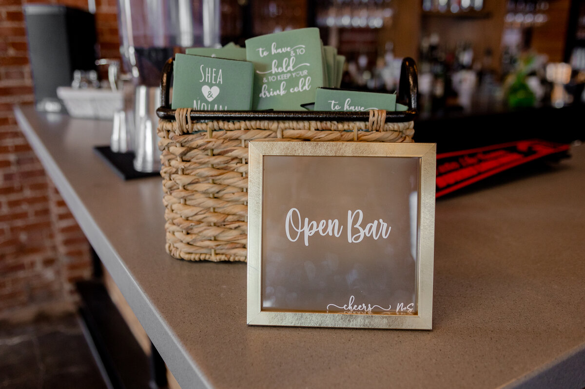 Creative wedding favor koozies captured by Style & Grace Photography in Lincoln County, MO, showcasing personalized and thoughtful details for guests at the wedding celebration.