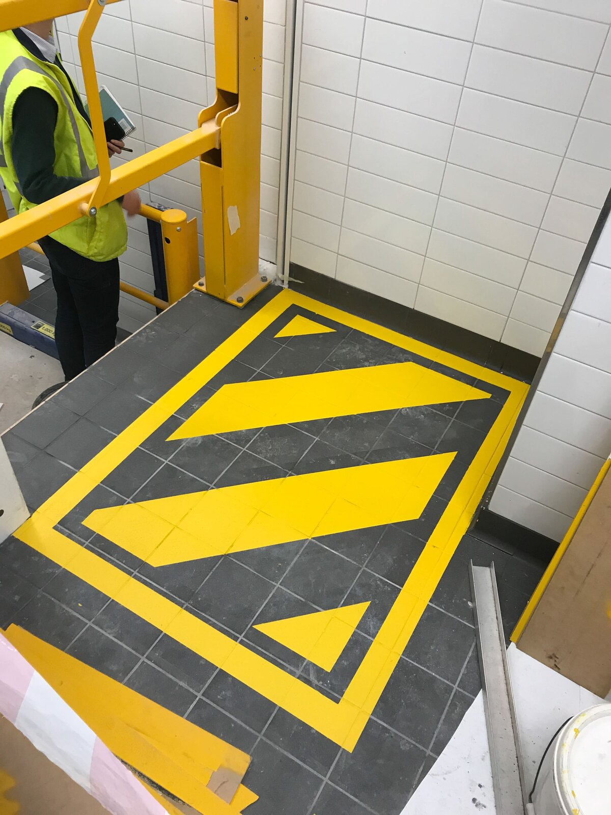 Safety line markings on external tiles.