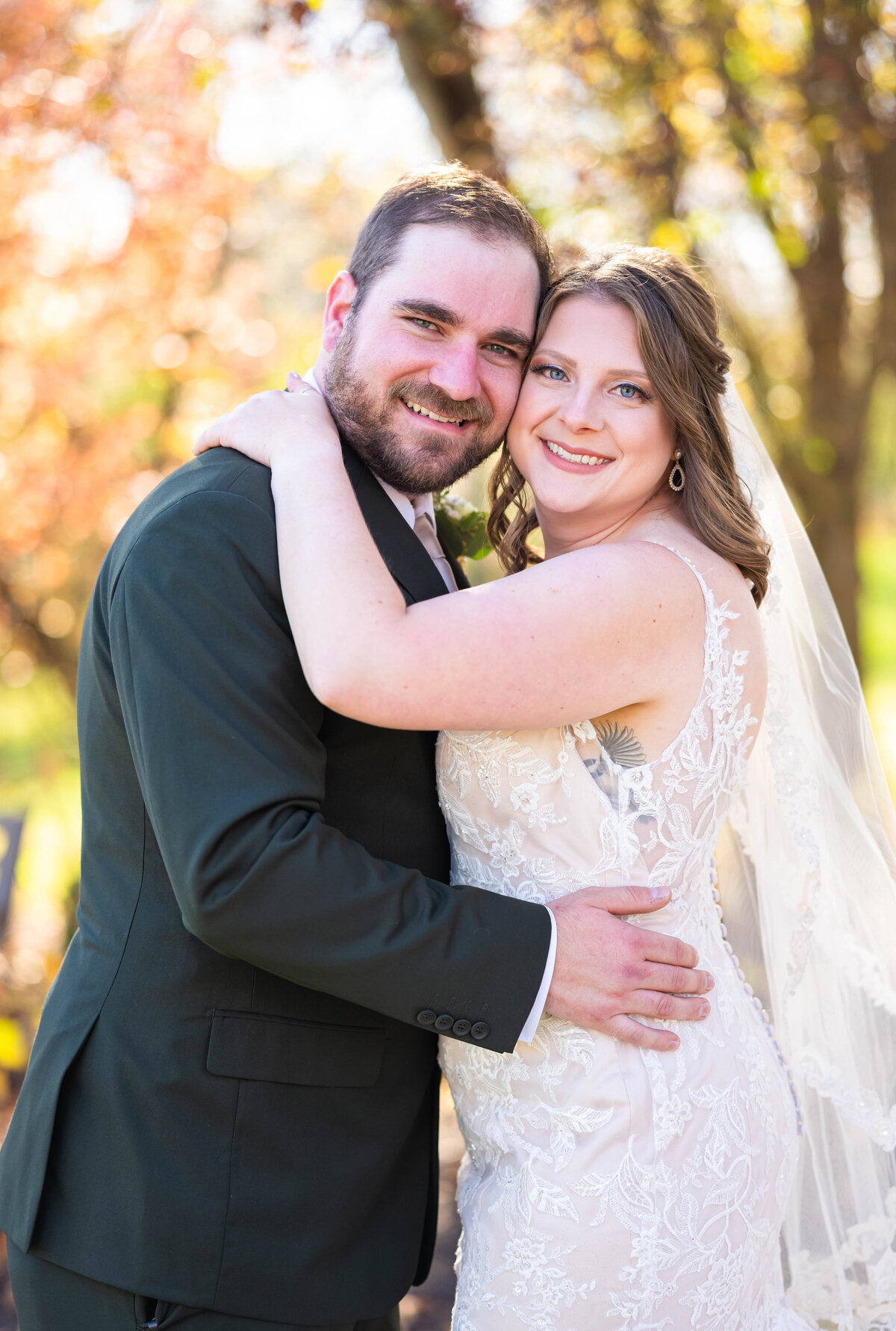 bride and groom hugging