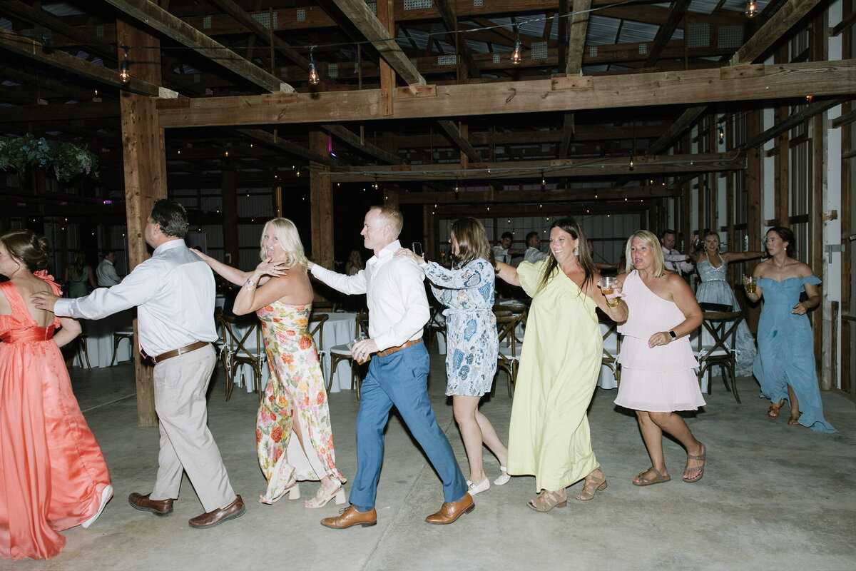 Guests dancing at Willstone Acres indoor reception barn in Central Kentucky
