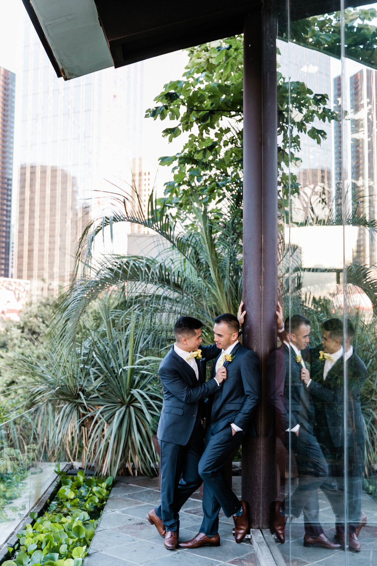 Portrait of two grooms at the Dallas World Aquarium