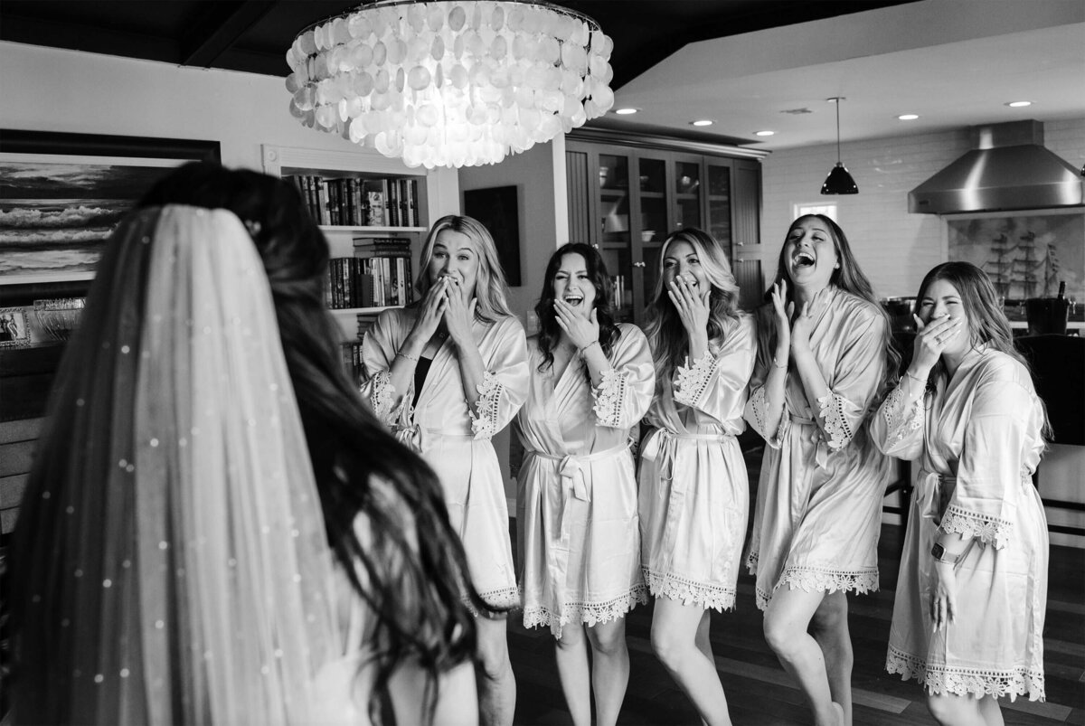 bride-first-look-bridesmaids-joyful-reaction