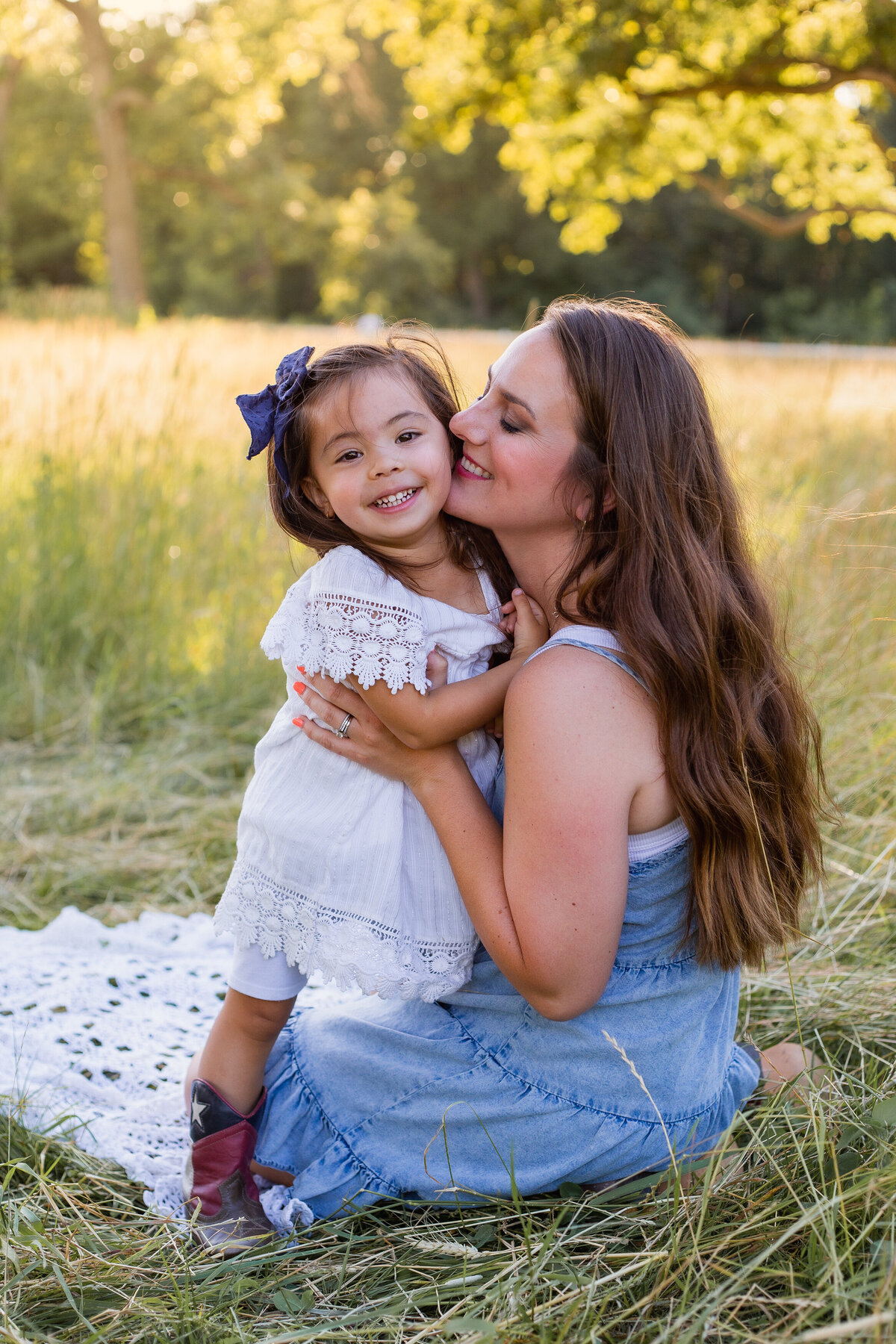 Mommy and daughter cuddles.