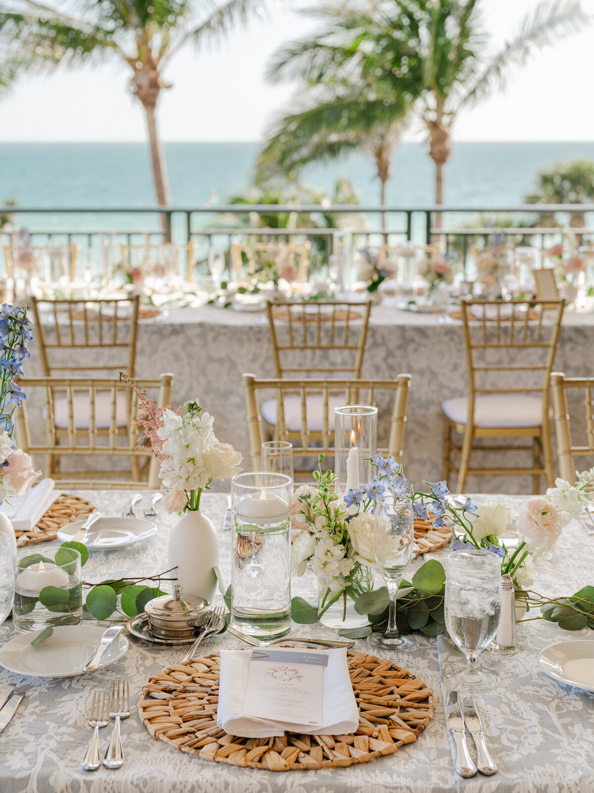 Reception tablescape for beachside colorful floral wedding