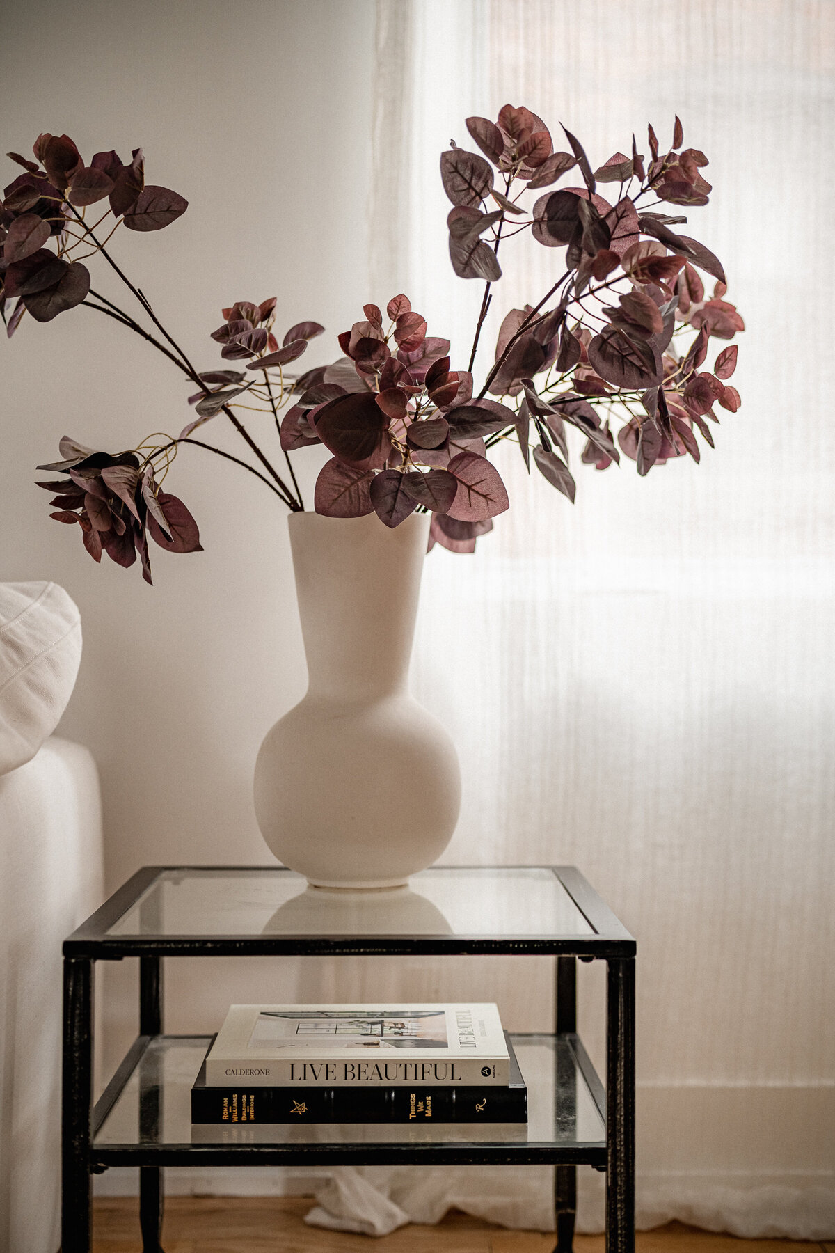 modern curved vase with branches