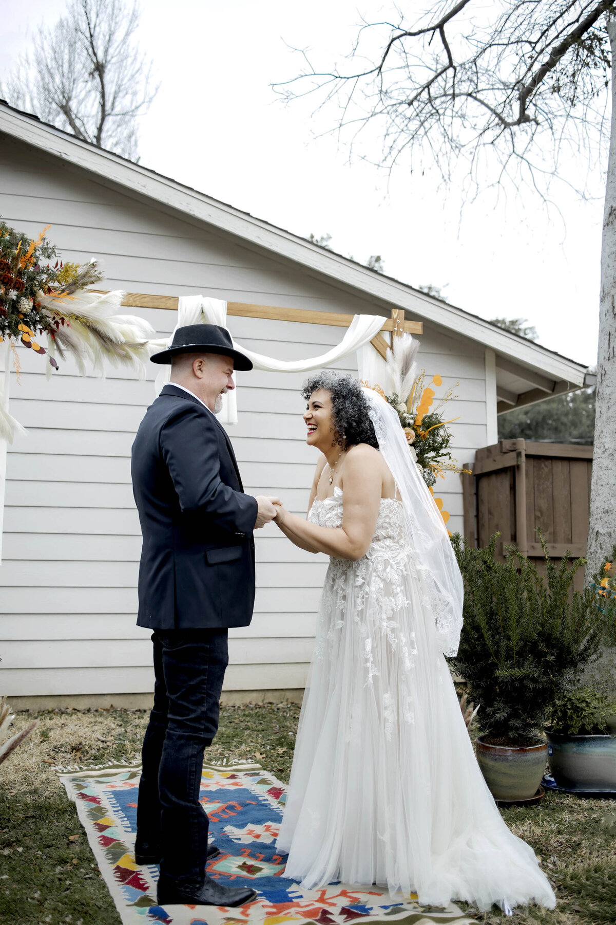 a bride and groom in dallas texas at a backyard wedding