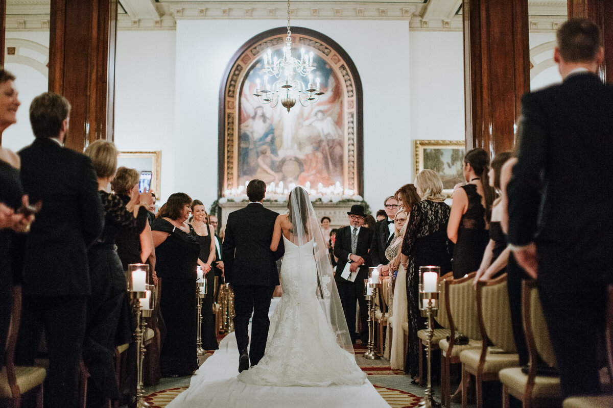 Bride walking down the aisle with father at Union League Club