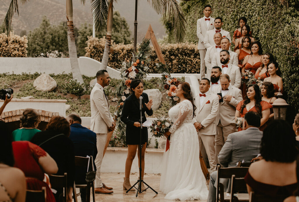 Ceremony looked over by the members of their wedding party
