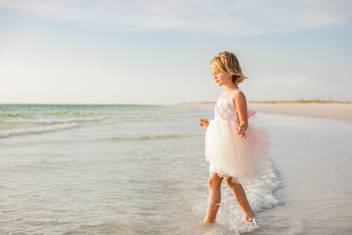 girl walking waves Ft. DeSoto Florida By Gwen Darrey Images By G