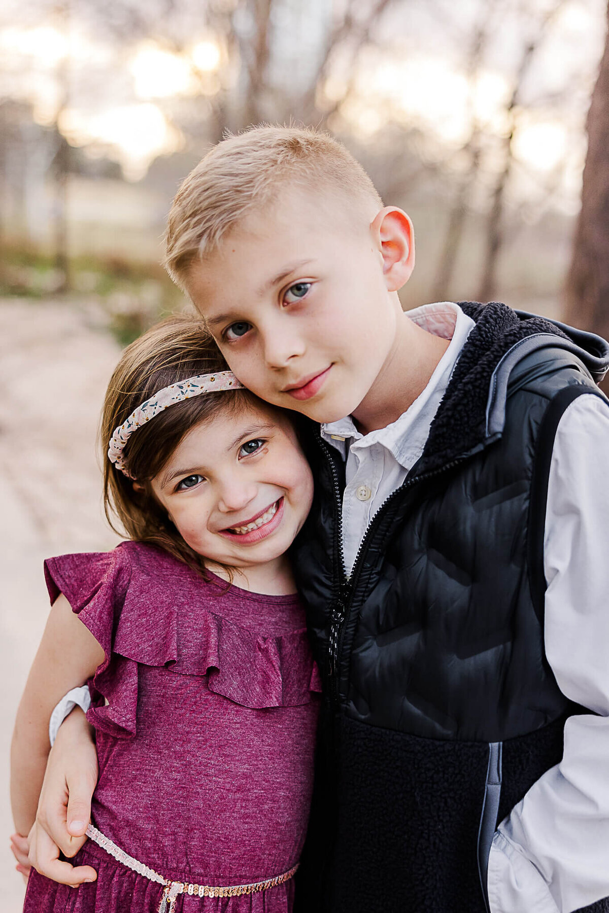 Brother and sister hugging