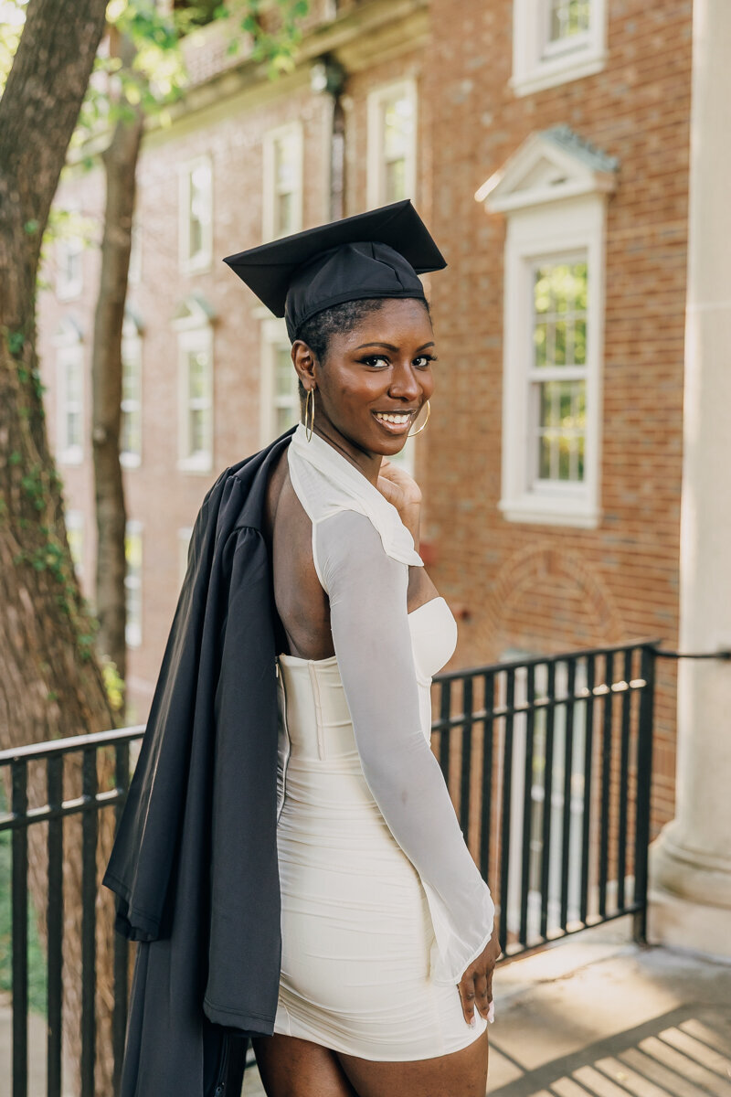 Vanderbilt University graduate looking over her right shoulder and smiling