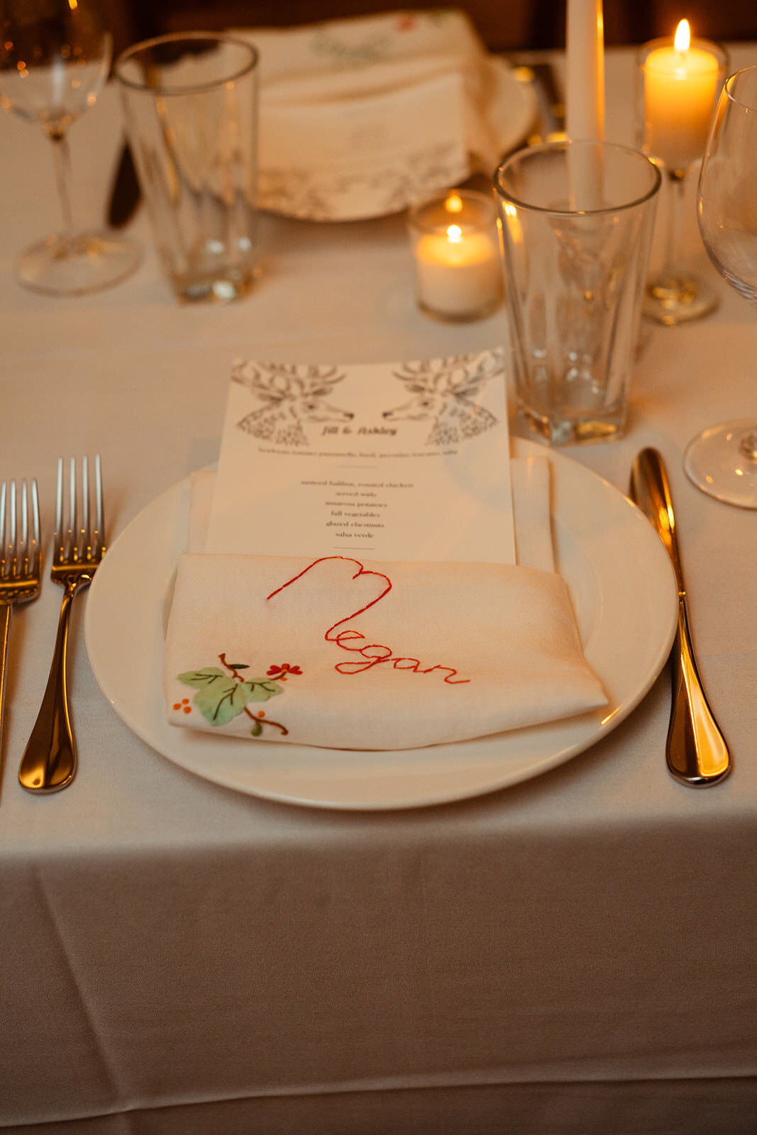 Close up of wedding menu with custom name napkins