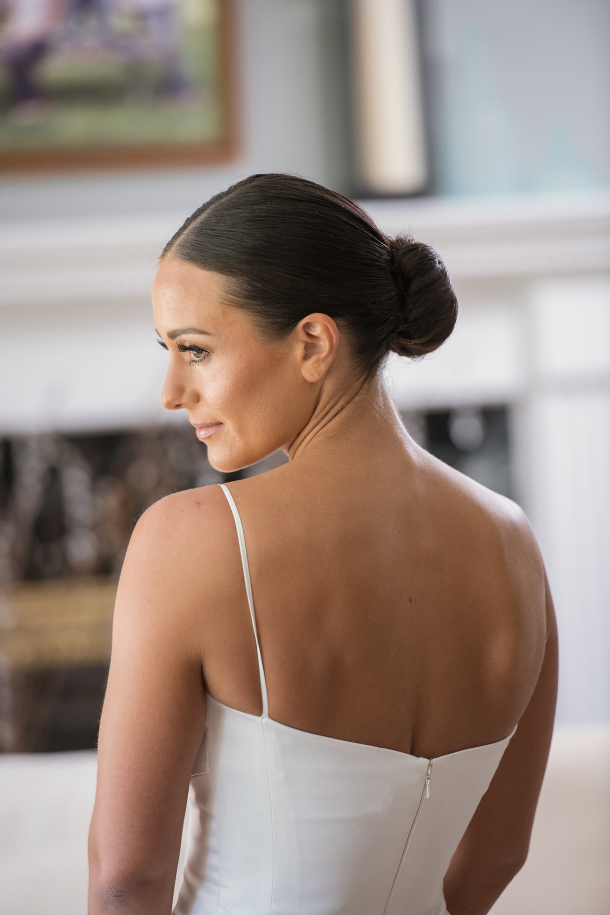 side and back profile of bride from wedding at The Muttontown Club
