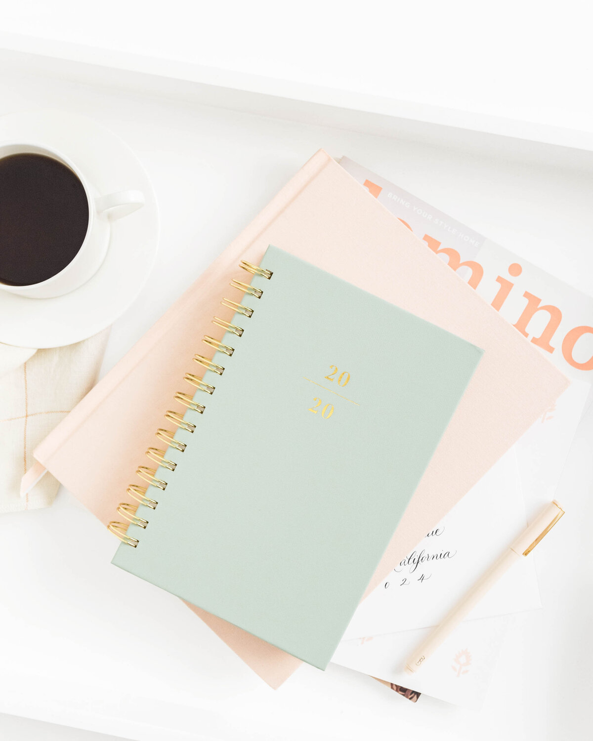 Sugar Paper_Planners on tray_pink desk_green spiral-web