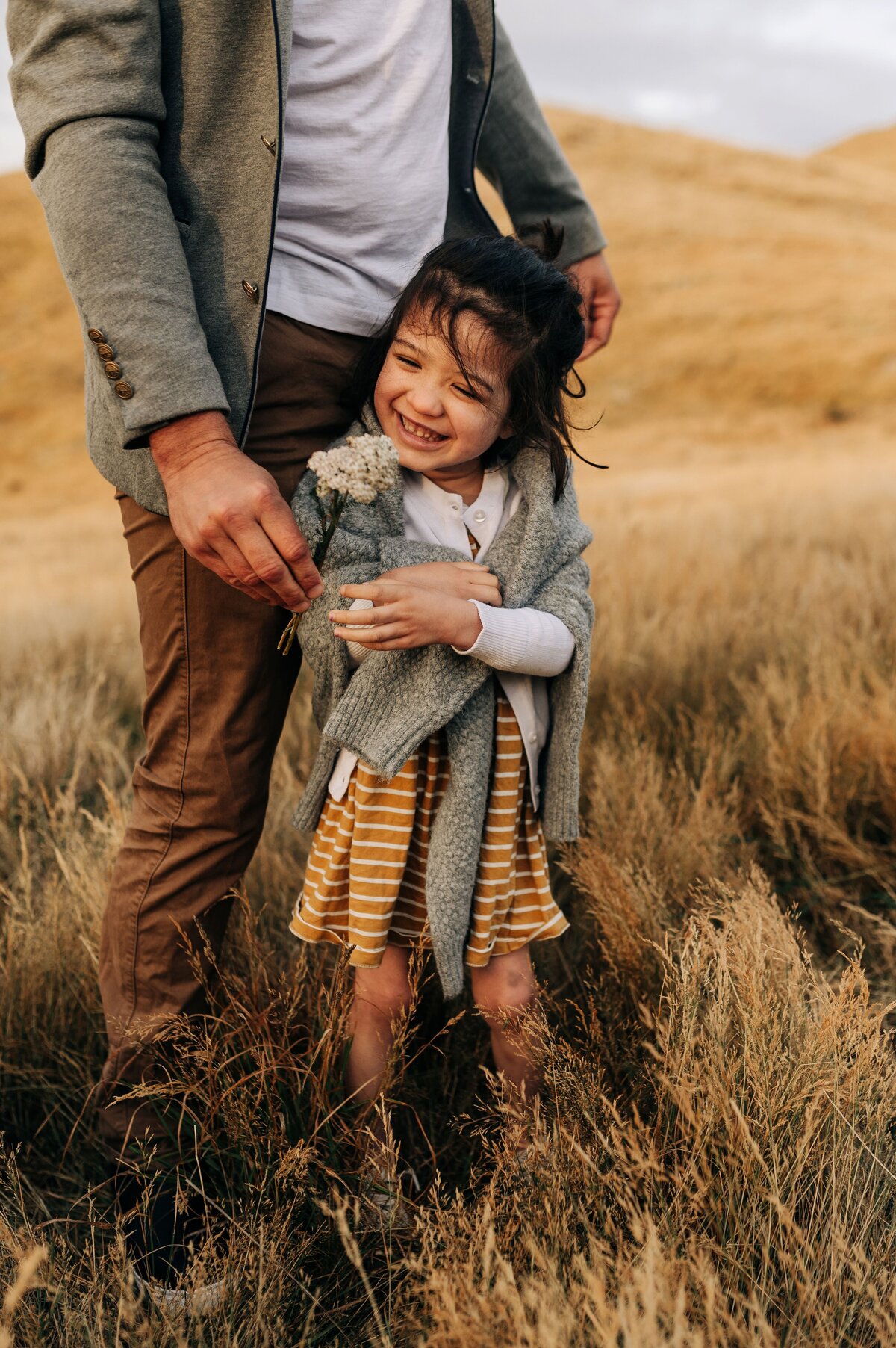 sweet girl christchurch port hills family photographer golden sunset daughter flower best dad