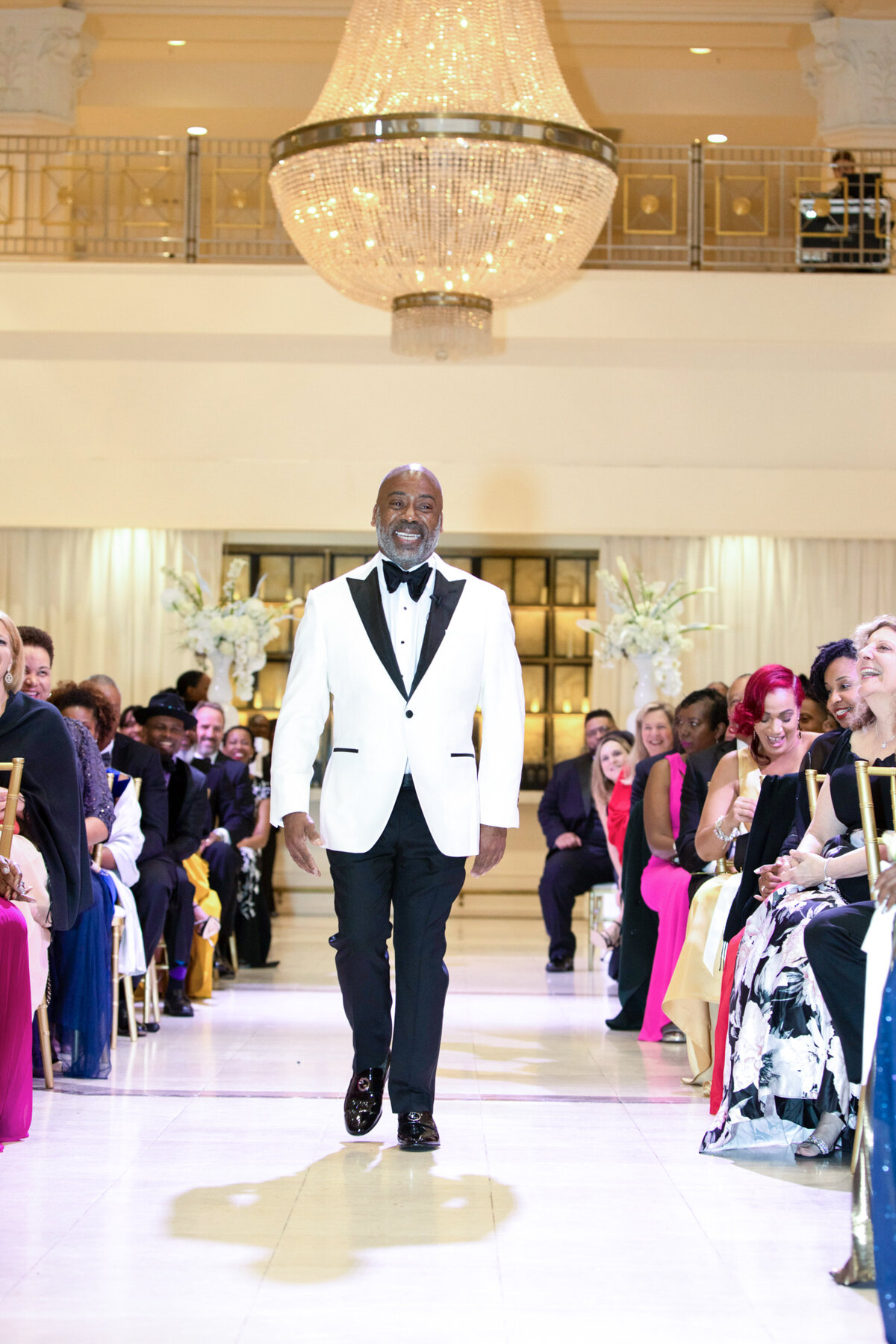 southern-exchange-ballroom-atlanta-wedding-groom-walking-aisl