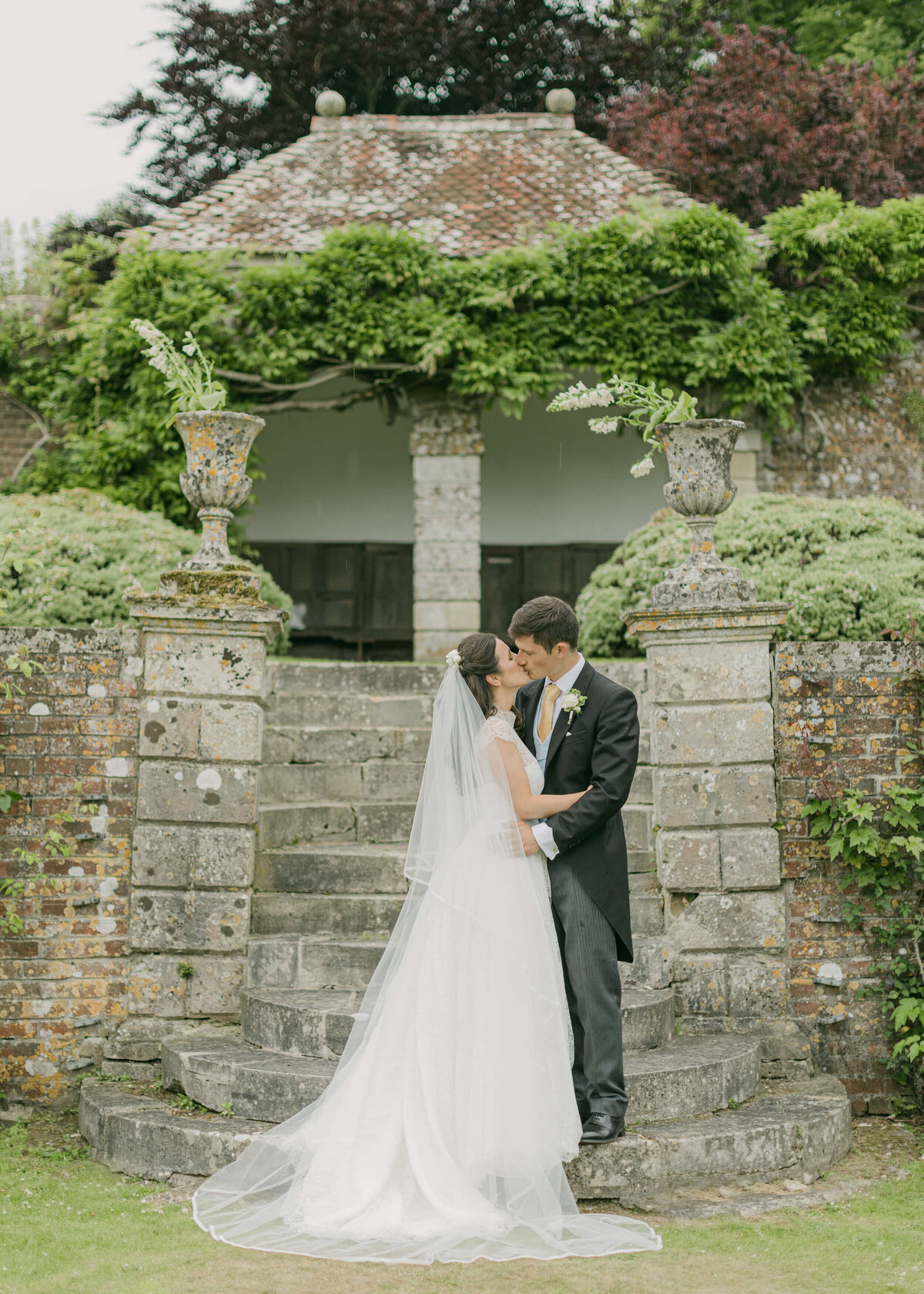 chloe-winstanley-weddings-wiltshire-hatch-house-walled-garden-kiss