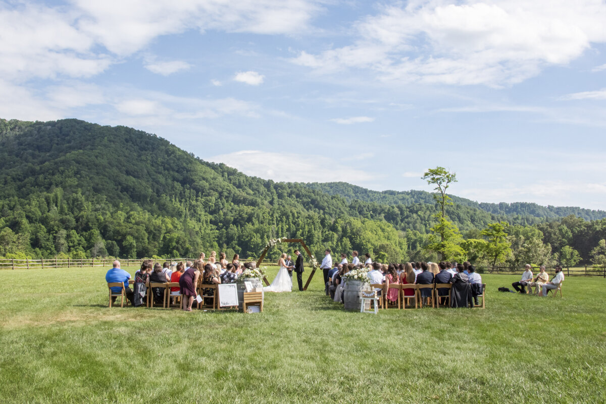 Wedding ceremony with mountain view at Claxton Farm
