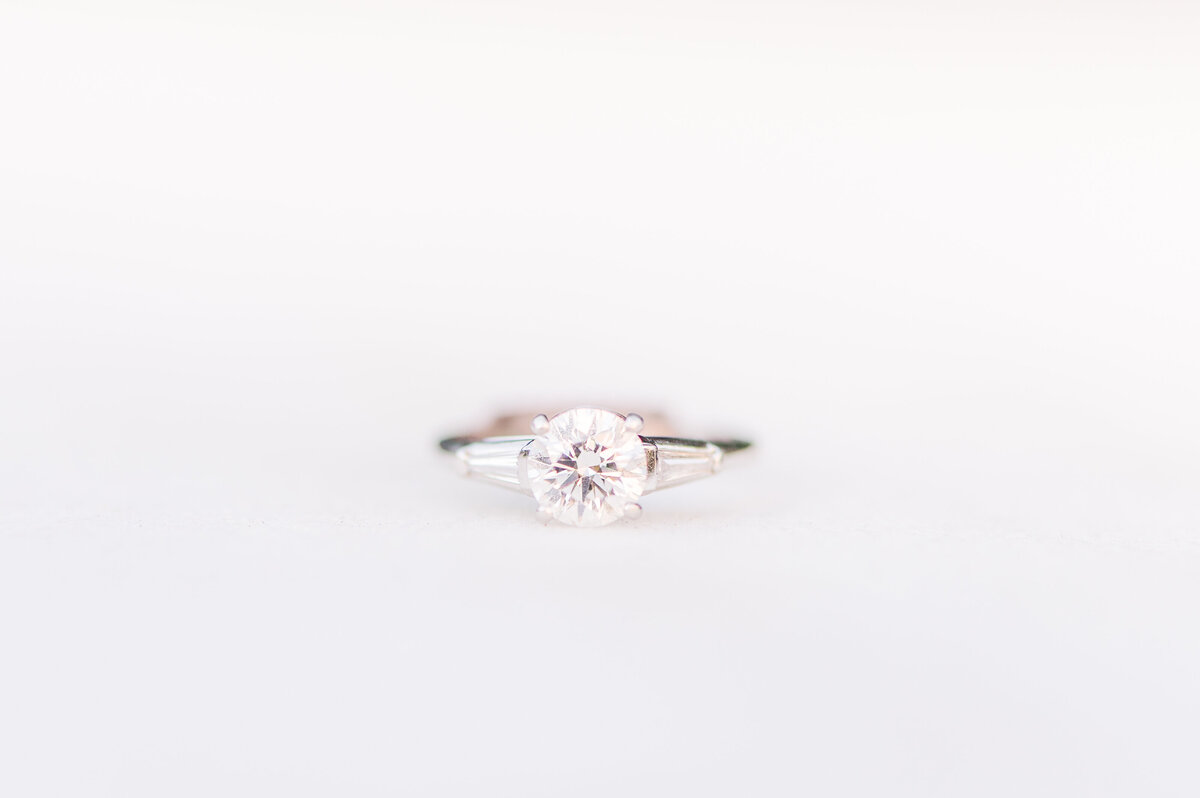engagement ring close up in marble background
