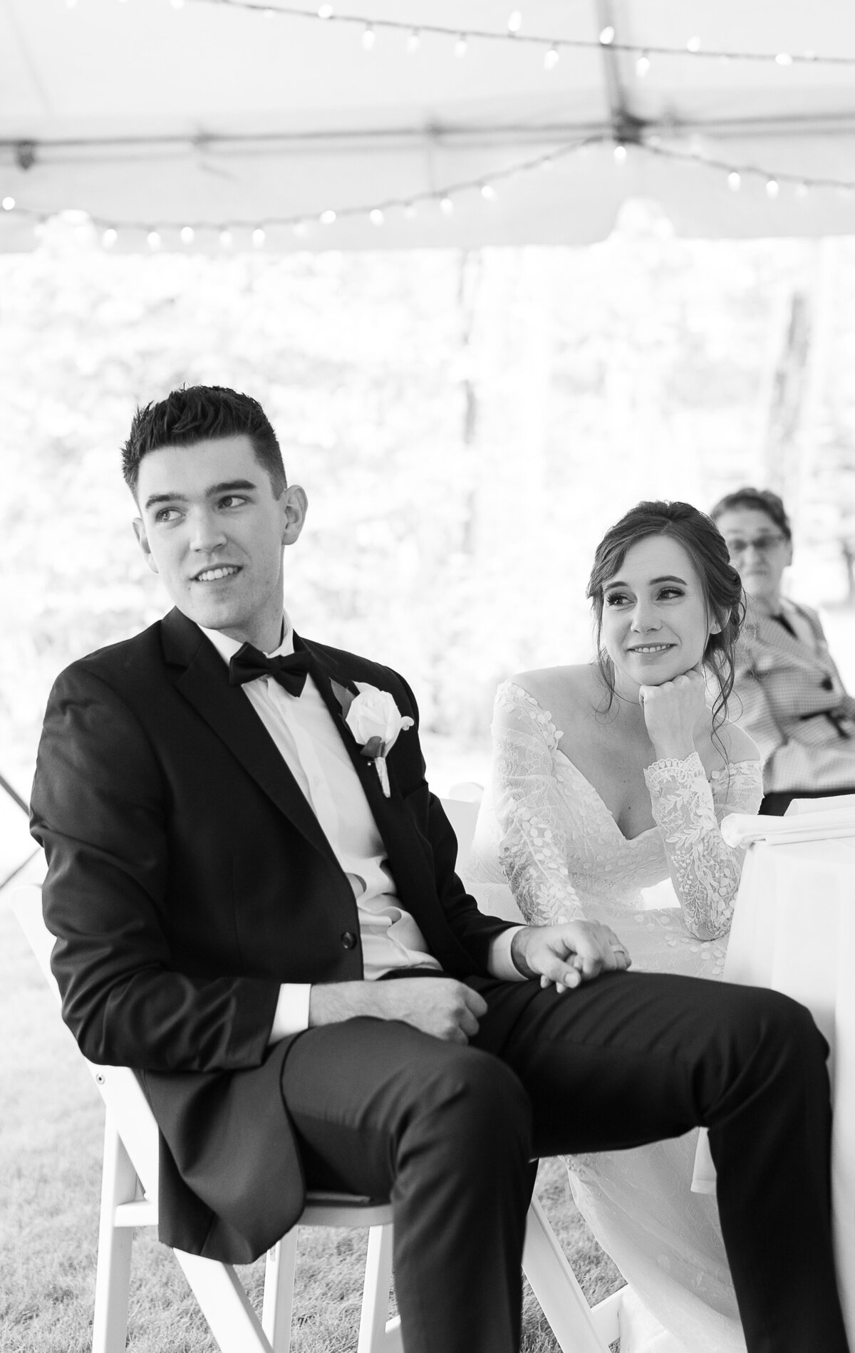 couple sitting at wedding reception