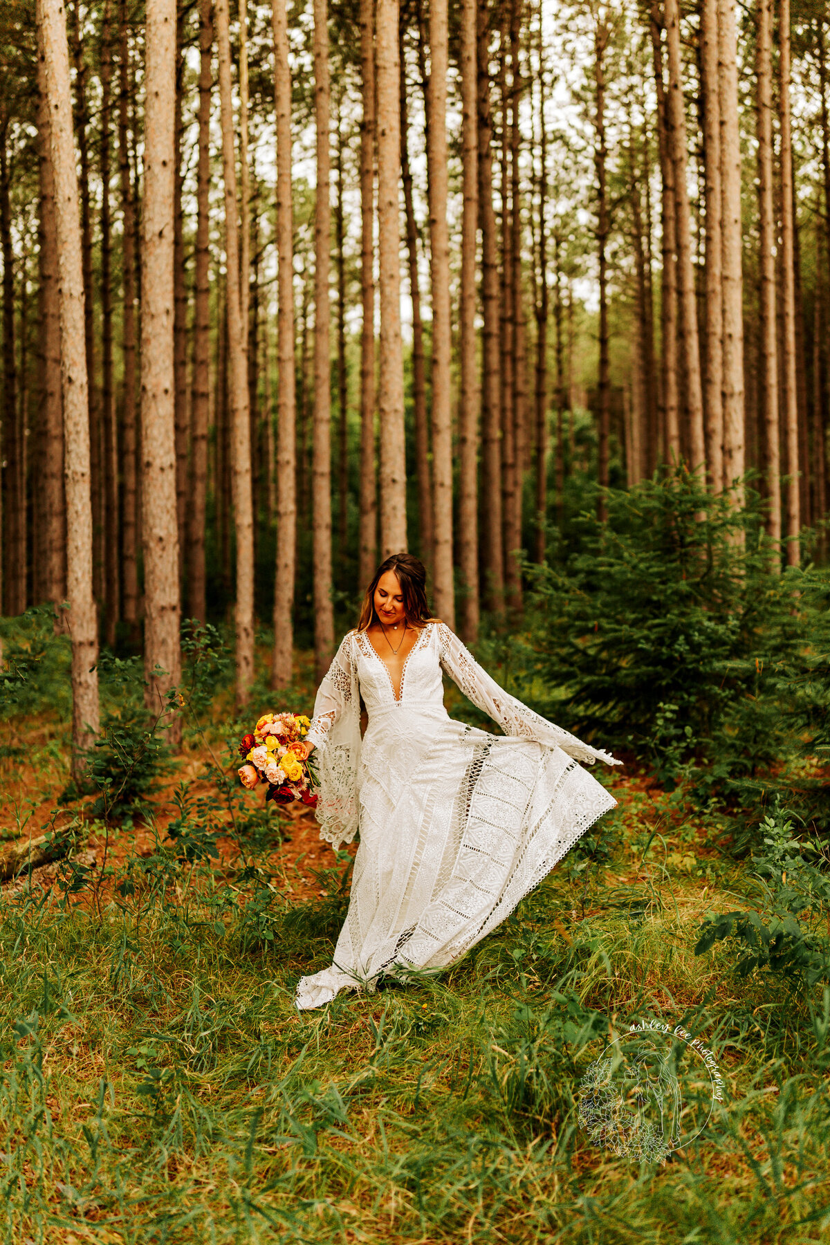 boho bride dancing at Pinewood