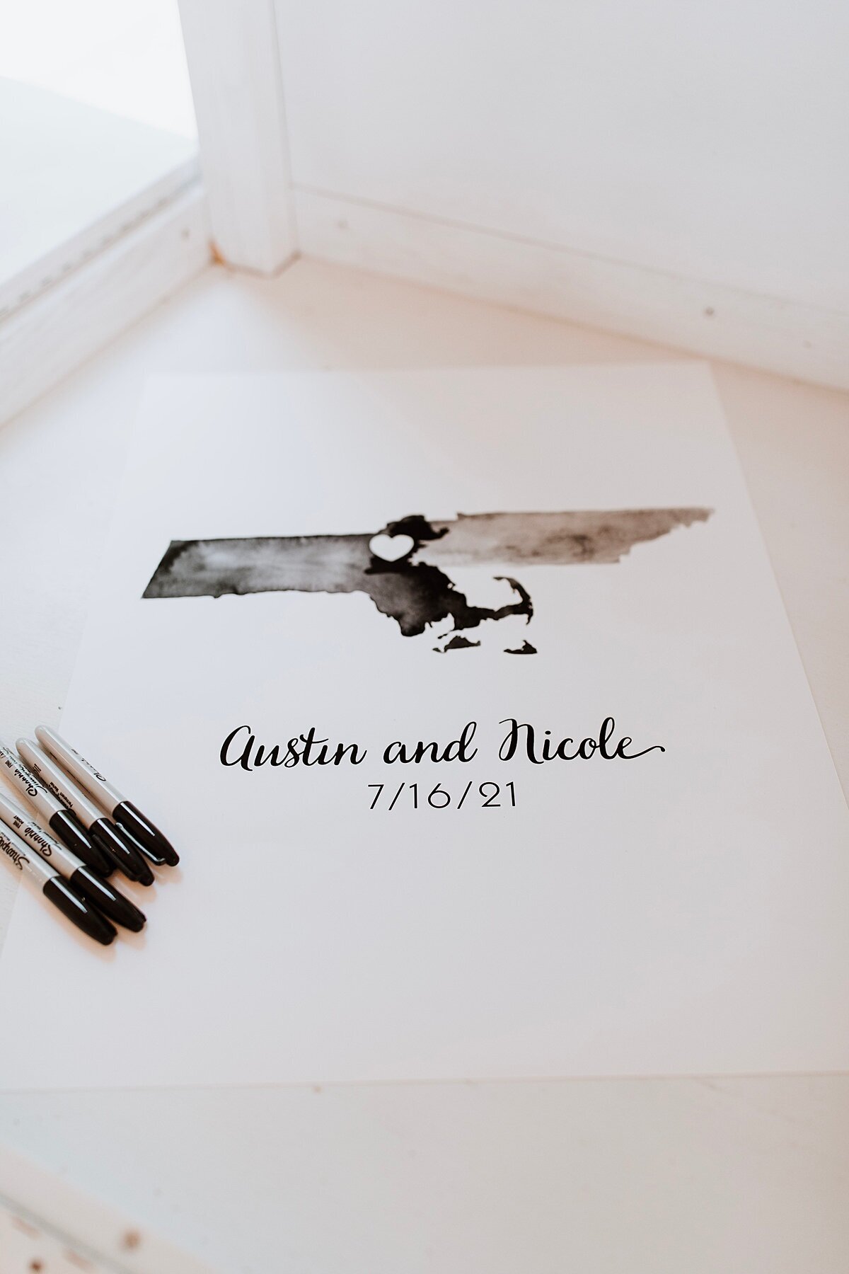 Wedding guest book with Tennessee and Massachusetts and wedding date with pens for guests to sign