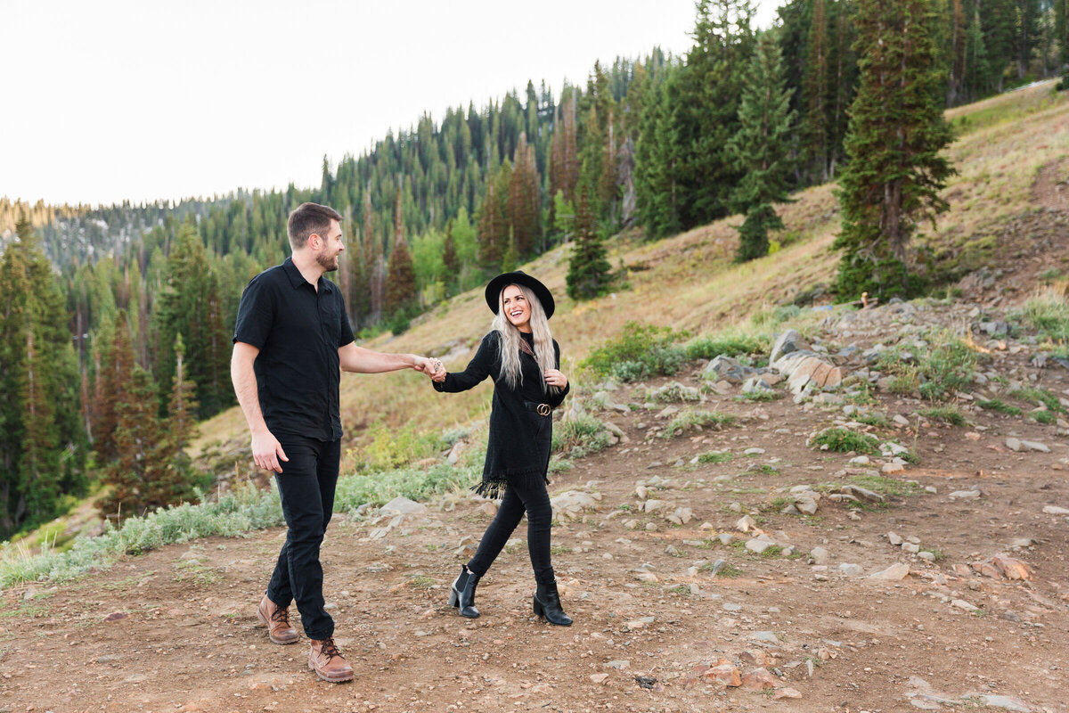 married couple walking together in Utah Canyon