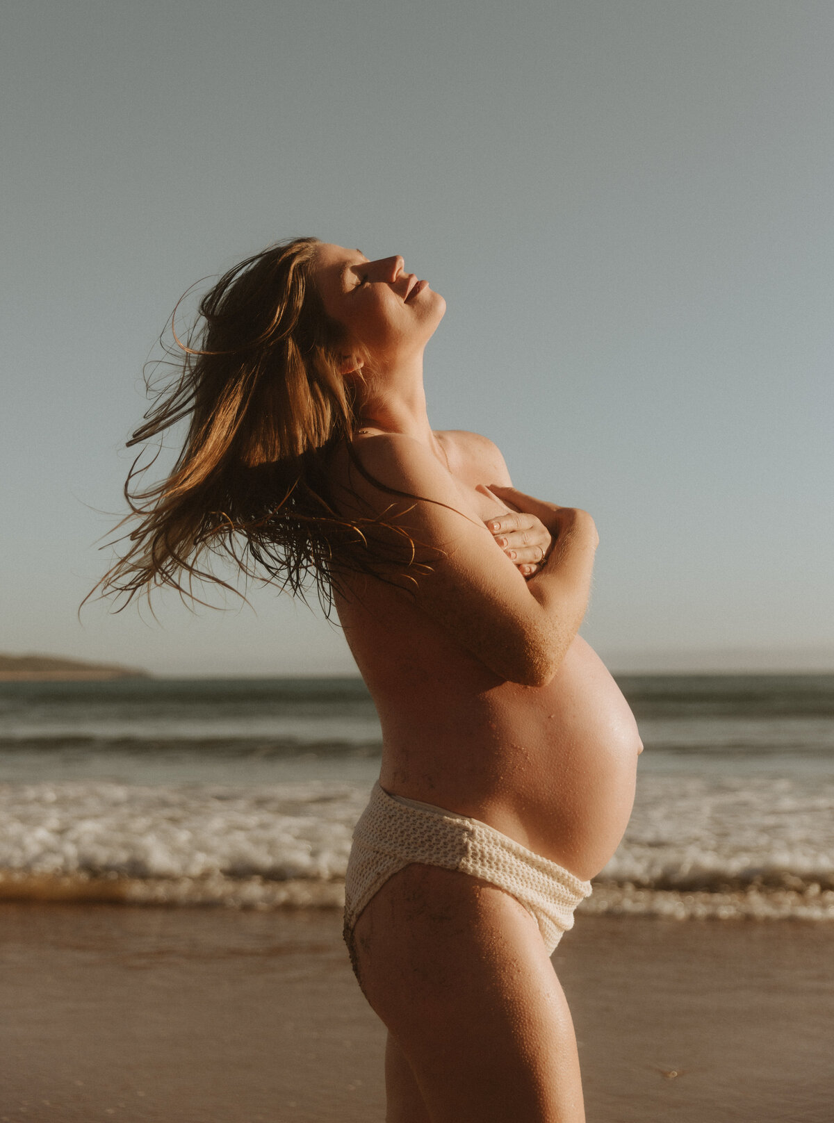 Maternity sunrise session on Main each in Agnes Water, Queensland