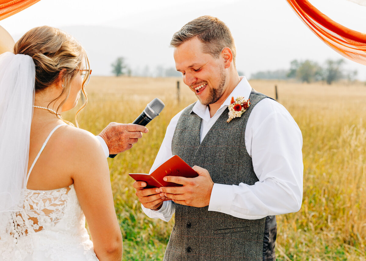 Groom reciting vows during ceremony at Cattle Springs in Arlee, MT