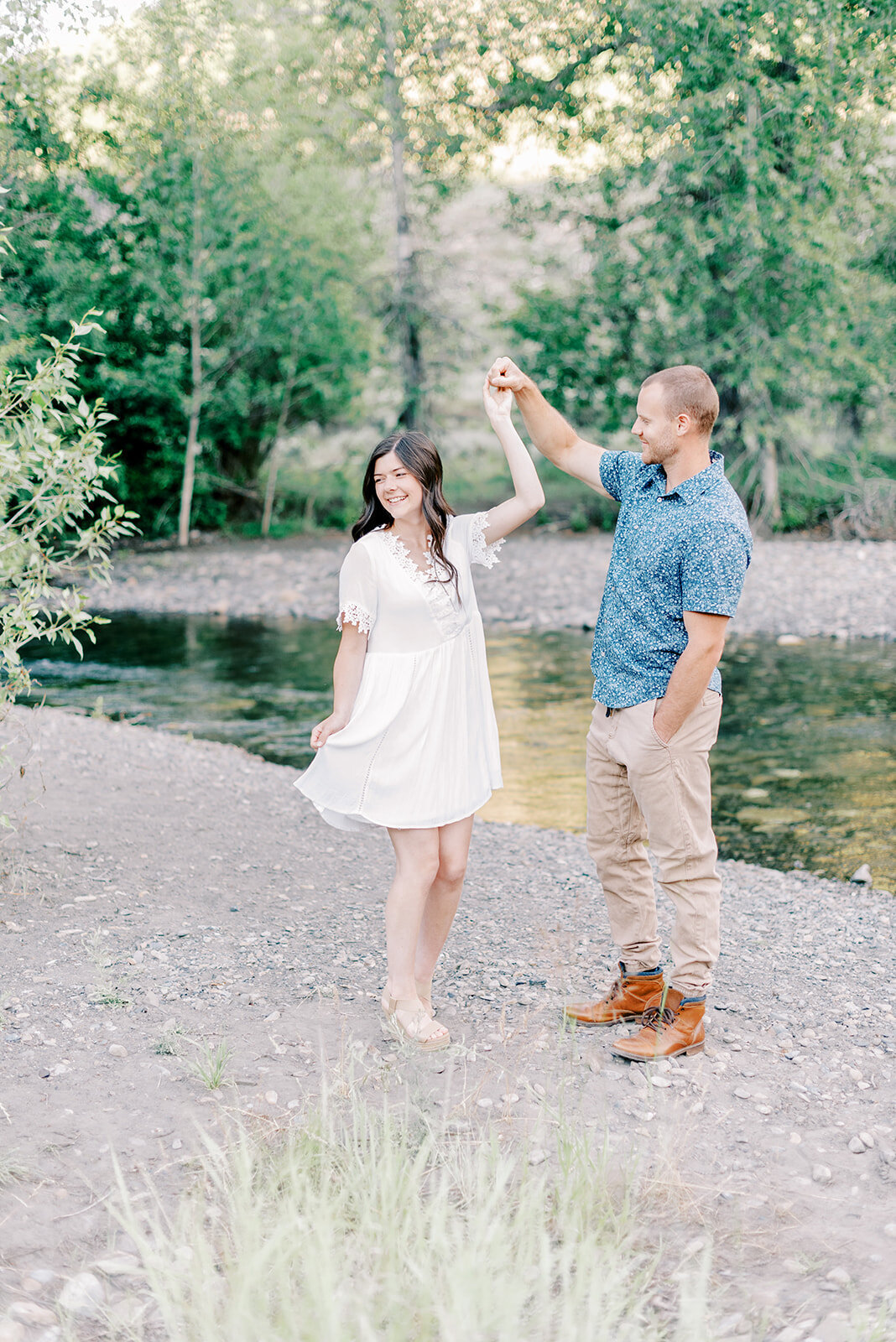 Twirling pose at Sun Valley Engagement Session with the Best Sun Valley Wedding Photographers