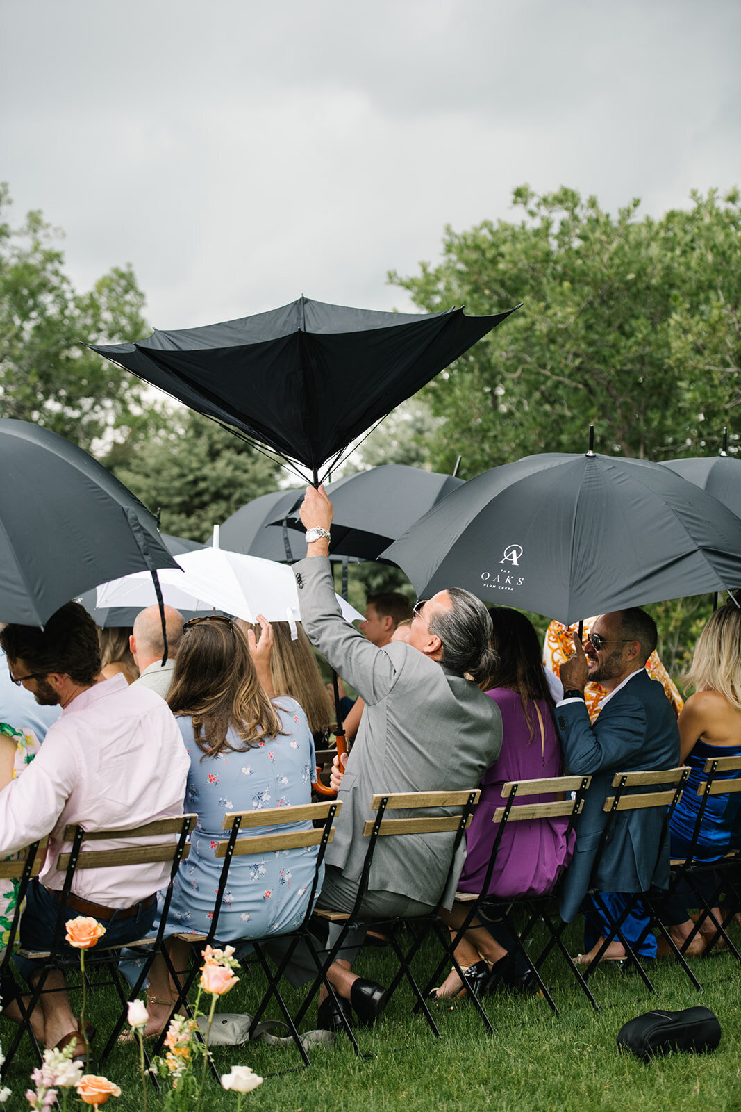 Guests reacting with joy during a wedding ceremony in Denver, captured on film and digital.