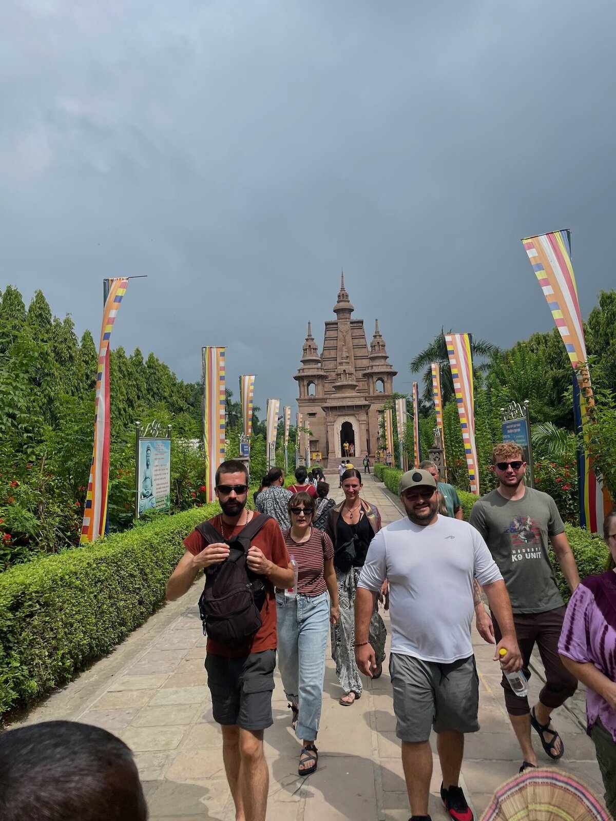 group in front of buddha temple