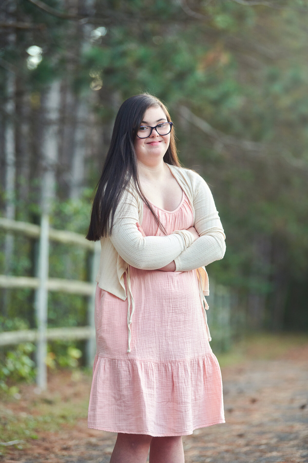 beautiful girl downs syndrome forest trees senior portraits