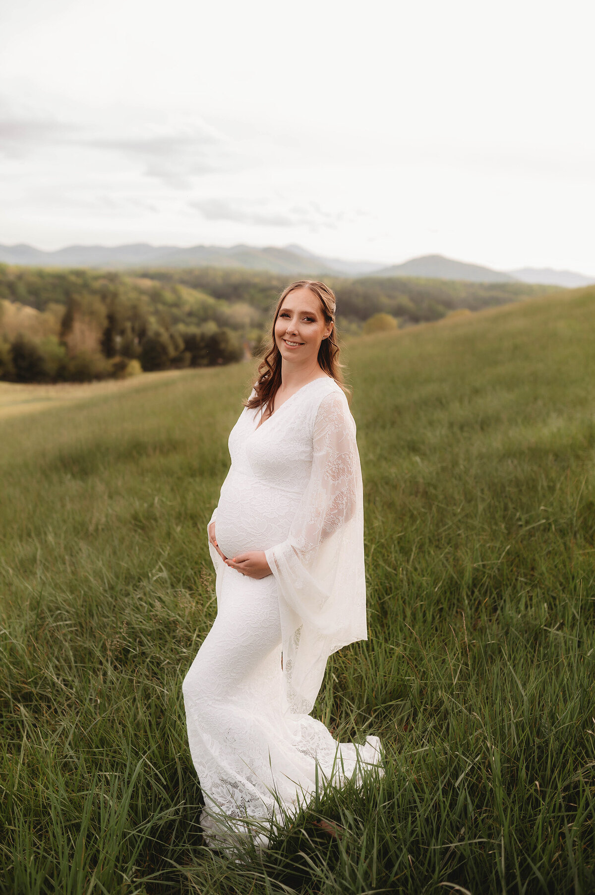 Expectant mother poses for Maternity Photos  in Asheville, NC.