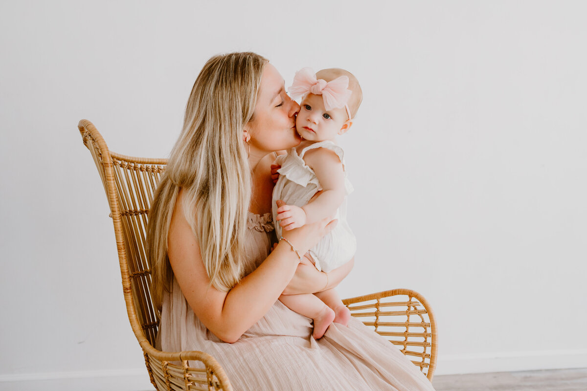 mother holding her daughter