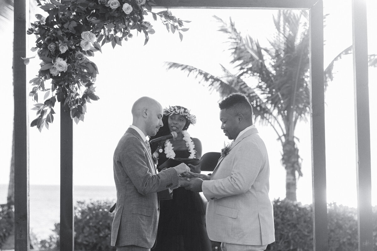 A couple exchanging rings during their wedding ceremony 