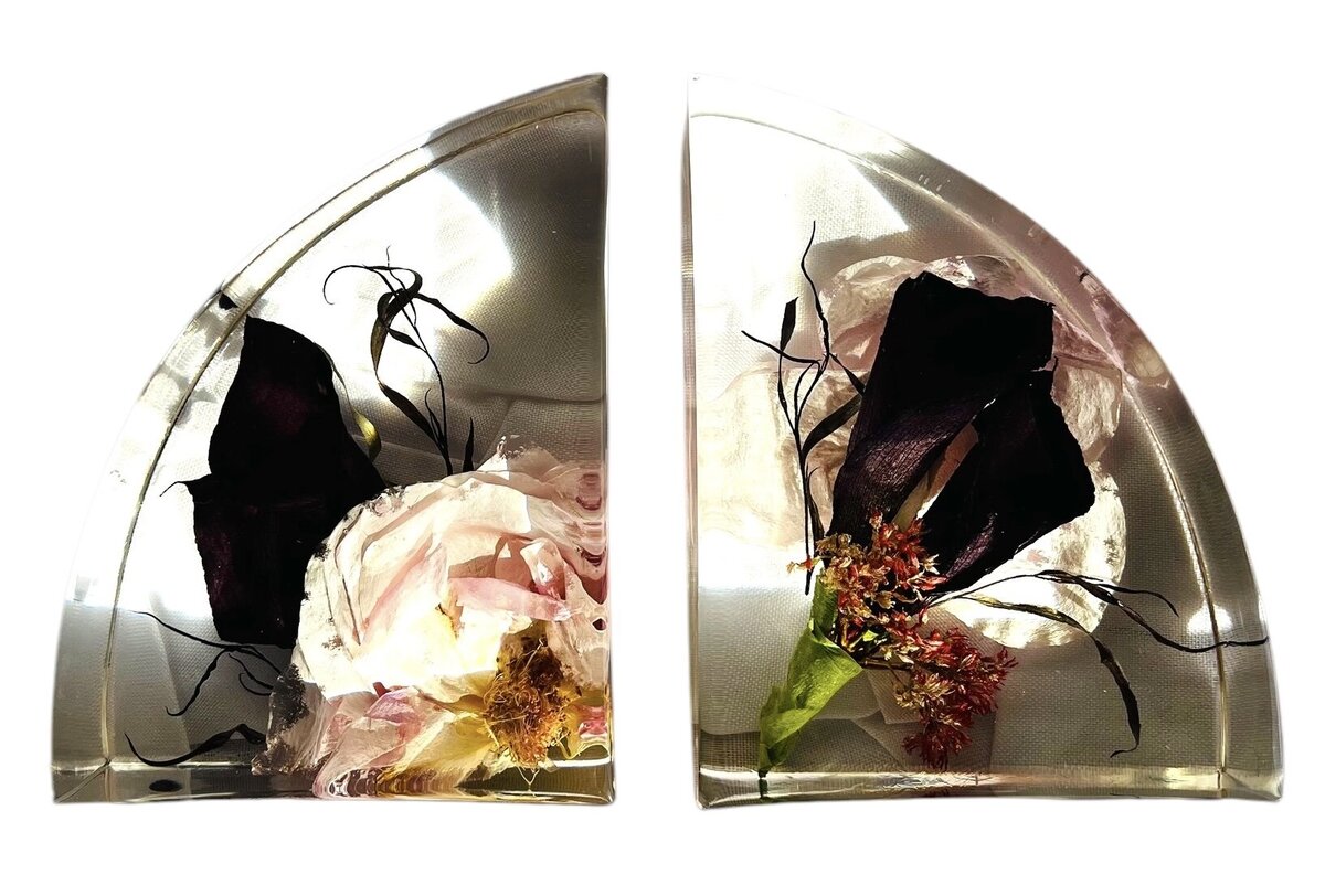 bookend resin block with burgundy and pink wedding bouquet and grooms boutonniere preserved as a family heirloom