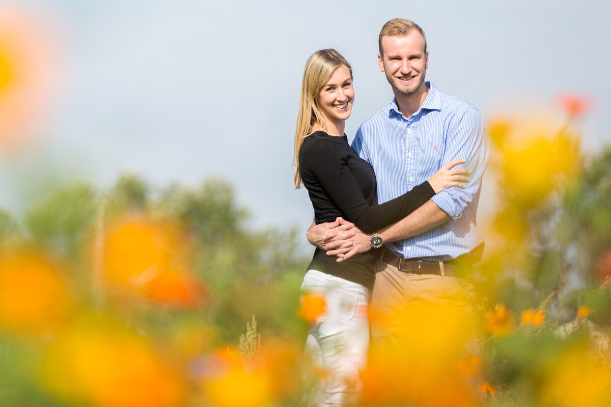 Couple portraits in yellow flowers