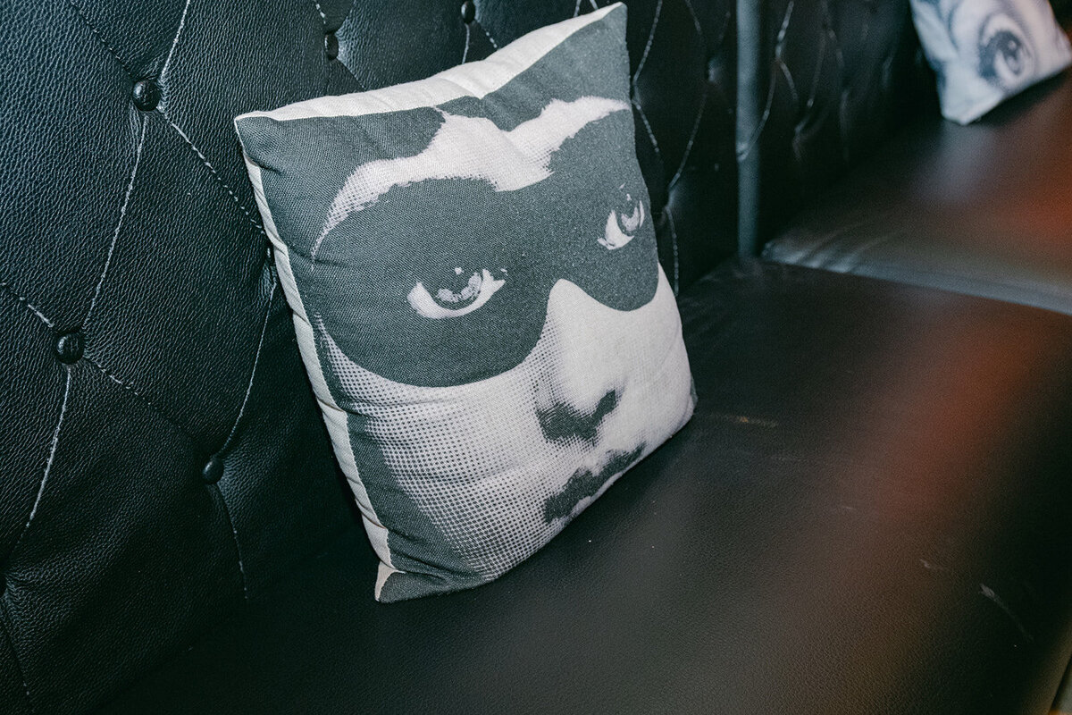 Black and white groom illustration napkin on pillow in the lounge at luxury San Antonio reception