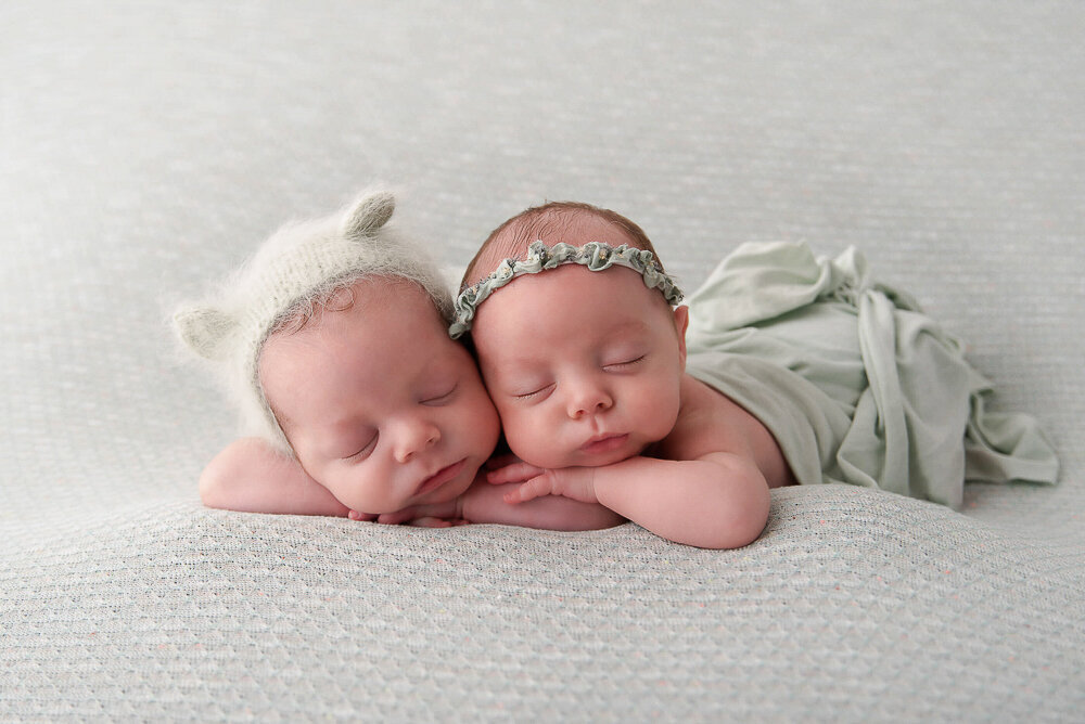twin boy and girl in mint green.