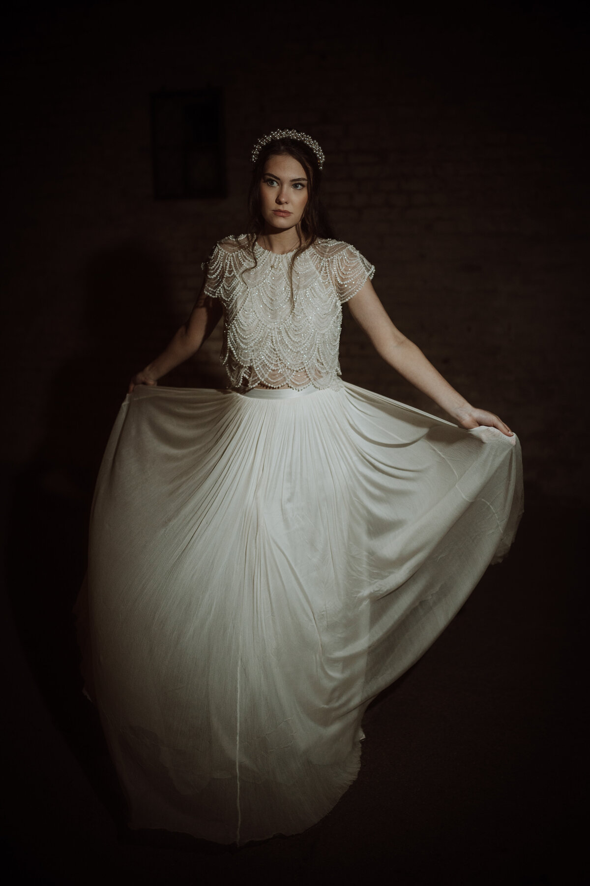 A bride dancing with wedding dress